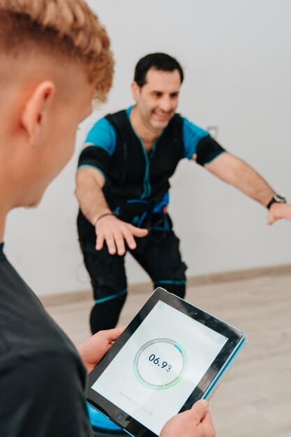 A physical therapist using AR to guide a patient through rehabilitation exercises, with digital overlays showing the correct form and range of motion.